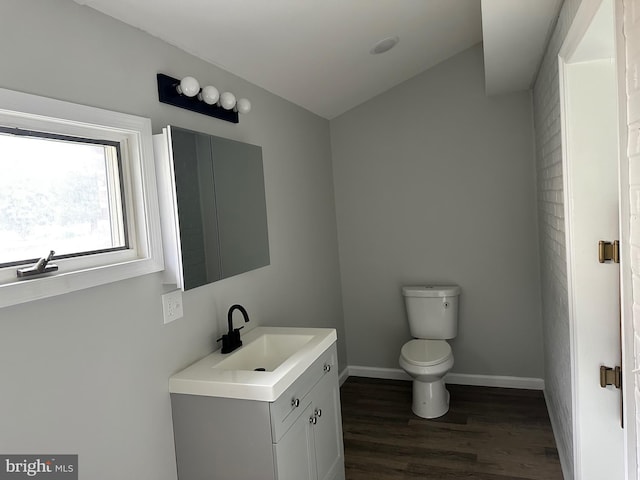 3333 Stone Ridge Rd, York, PA 17402 - bathroom featuring vanity, toilet, wood finished floors, and baseboards