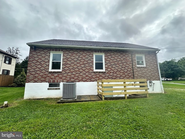 3333 Stone Ridge Rd, York, PA 17402 - back of house featuring central AC unit and brick siding