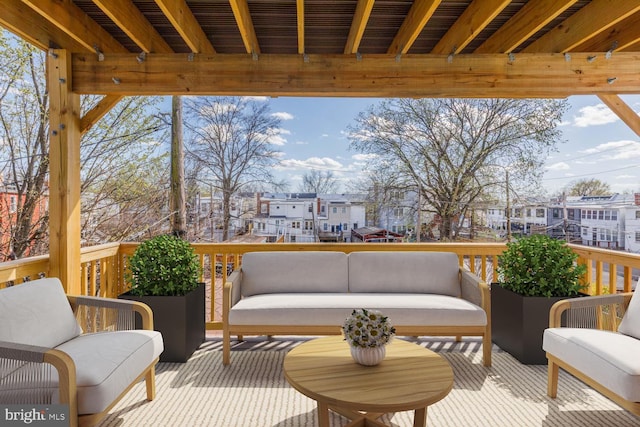 balcony featuring an outdoor hangout area and a residential view
