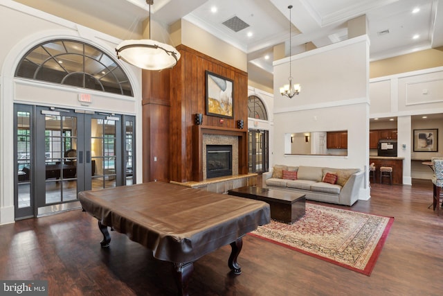 2301 25th St S Unit 4-303, Arlington, VA 22206 - game room featuring a towering ceiling, coffered ceiling, crown molding, french doors, and dark wood finished floors