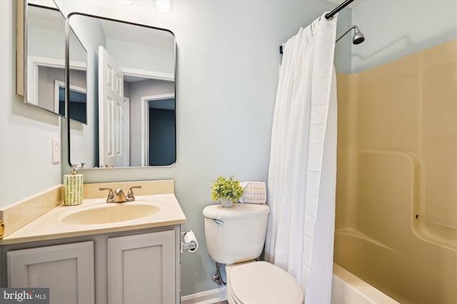 3331 Arundel On The Bay Rd, Annapolis, MD 21403 - bathroom featuring toilet, vanity, and shower / tub combo