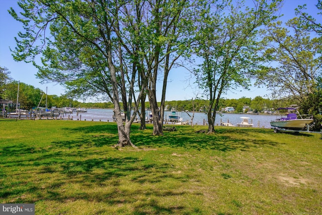 3331 Arundel On The Bay Rd, Annapolis, MD 21403 - view of grassy yard featuring a water view and a boat dock