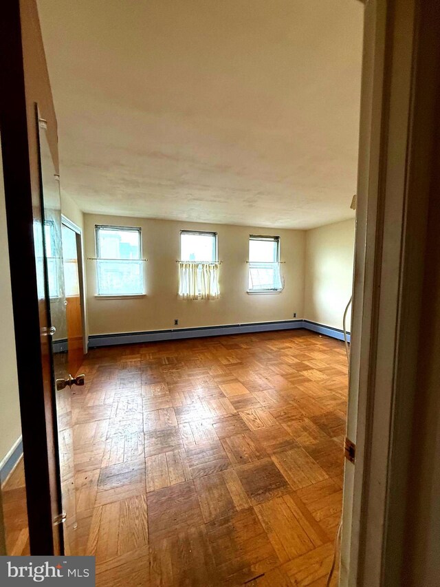 446 N Daggett St, Philadelphia, PA 19151 - empty room with baseboards and baseboard heating