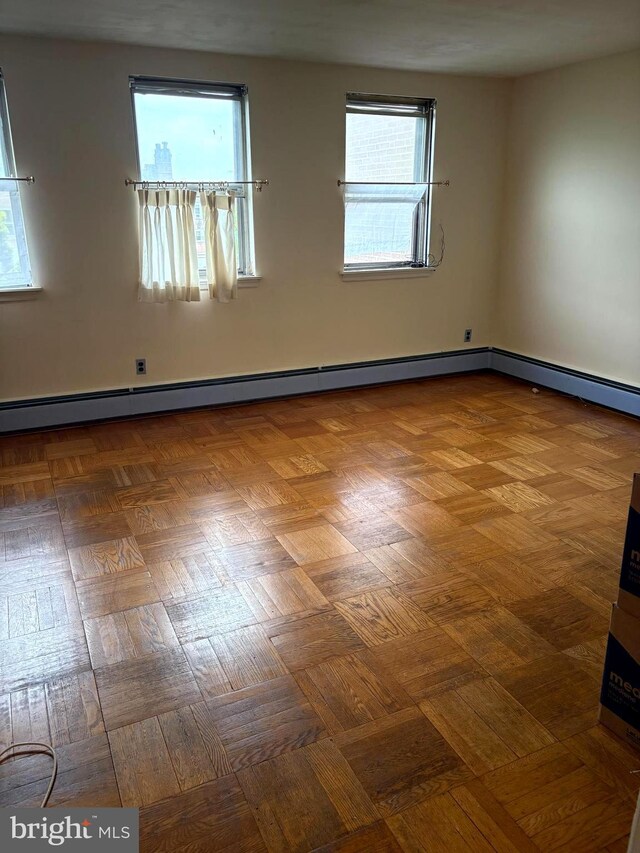 446 N Daggett St, Philadelphia, PA 19151 - unfurnished room featuring a baseboard radiator