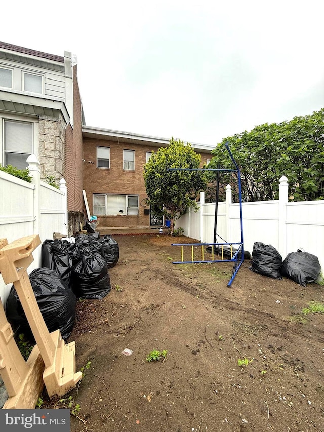 446 N Daggett St, Philadelphia, PA 19151 - view of yard featuring fence and a trampoline