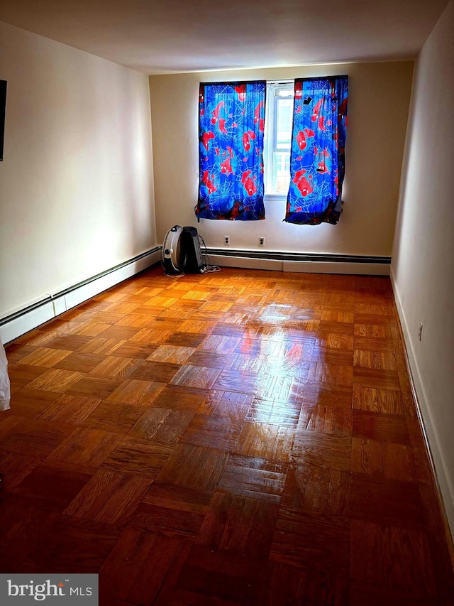 446 N Daggett St, Philadelphia, PA 19151 - empty room with a baseboard heating unit