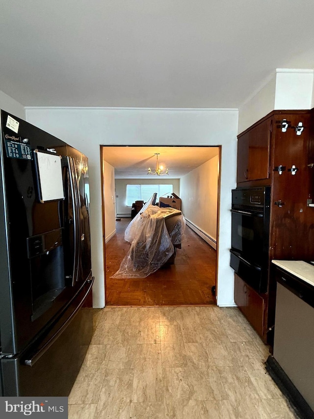 446 N Daggett St, Philadelphia, PA 19151 - interior space with a chandelier and a baseboard heating unit
