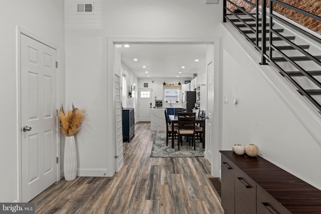 1807 N 27th St, Philadelphia, PA 19121 - entryway with dark wood-style flooring, stairway, recessed lighting, and baseboards
