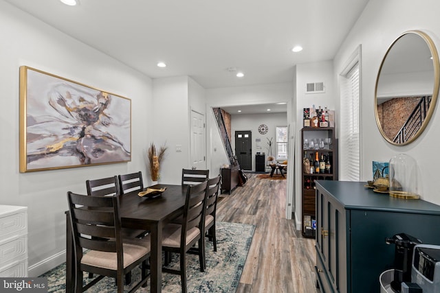 1807 N 27th St, Philadelphia, PA 19121 - dining space with a dry bar, light wood-style flooring, recessed lighting, and baseboards