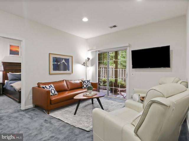 living area with carpet floors and recessed lighting