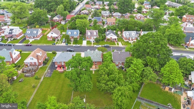 aerial view of property's location featuring nearby suburban area