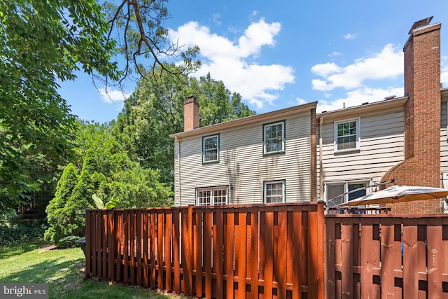 3901 Bradwater St, Fairfax, VA 22031 - rear view of property featuring a chimney