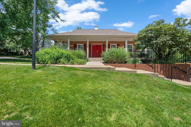 3901 Bradwater St, Fairfax, VA 22031 - view of front facade with a front lawn, brick siding, a porch, and a chimney