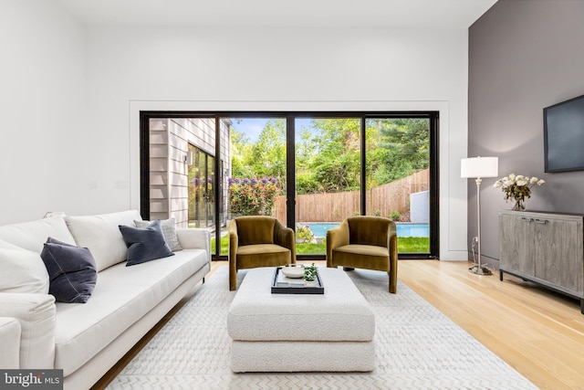 3554 Military Rd, Arlington, VA 22207 - living area featuring wood finished floors and plenty of natural light