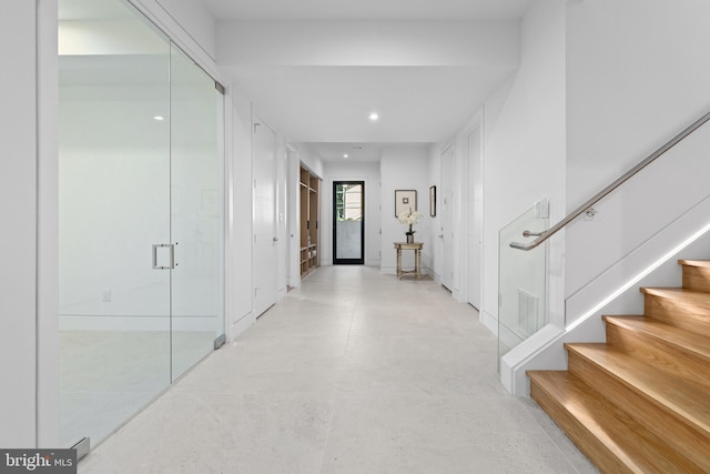 3554 Military Rd, Arlington, VA 22207 - hallway with stairway, recessed lighting, and concrete flooring