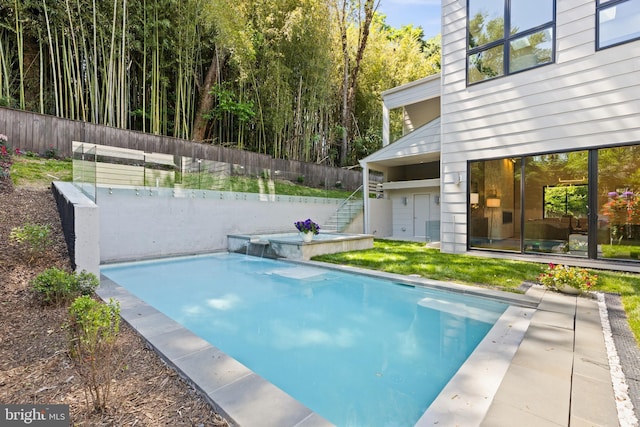 3554 Military Rd, Arlington, VA 22207 - view of swimming pool featuring stairway, a fenced backyard, and a pool with connected hot tub
