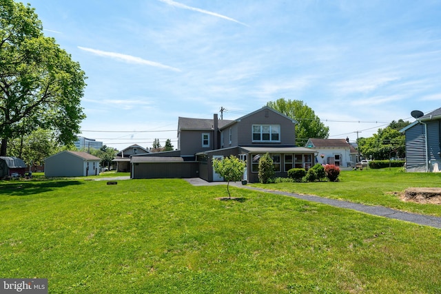334 Windsor St, Wyomissing, PA 19610 - back of house featuring a lawn