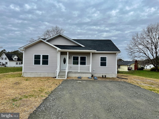 826 S Glebe Rd, Montross, VA 22520 - bungalow-style home featuring covered porch and roof with shingles
