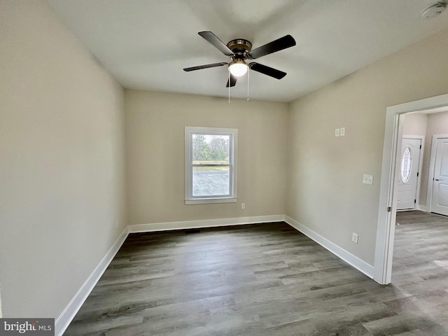 826 S Glebe Rd, Montross, VA 22520 - spare room with a ceiling fan, wood finished floors, and baseboards