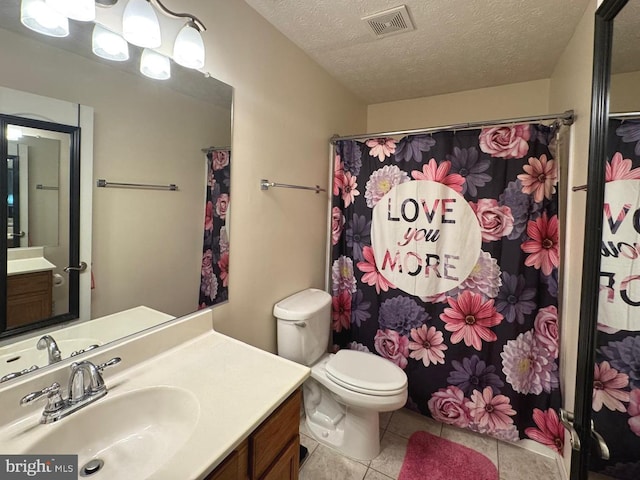106 Perth Amboy Ct, Upper Marlboro, MD 20774 - full bath with vanity, tile patterned floors, a textured ceiling, toilet, and a shower with curtain