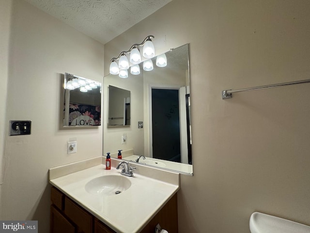 106 Perth Amboy Ct, Upper Marlboro, MD 20774 - bathroom featuring vanity, a textured ceiling, and toilet