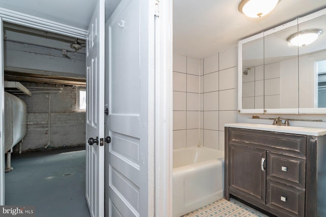 full bath with vanity, oil tank, and shower / tub combination