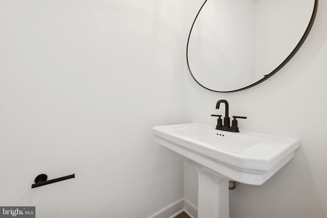 bathroom featuring baseboards