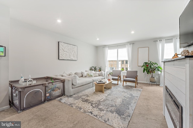 2314 Emerson Ln, Fredericksburg, VA 22401 - carpeted living room with plenty of natural light, a fireplace, recessed lighting, and baseboards