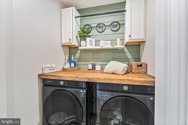 2314 Emerson Ln, Fredericksburg, VA 22401 - laundry room featuring washing machine and clothes dryer and cabinet space