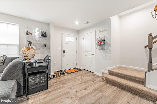 2314 Emerson Ln, Fredericksburg, VA 22401 - foyer entrance featuring stairway, light wood finished floors, baseboards, and recessed lighting