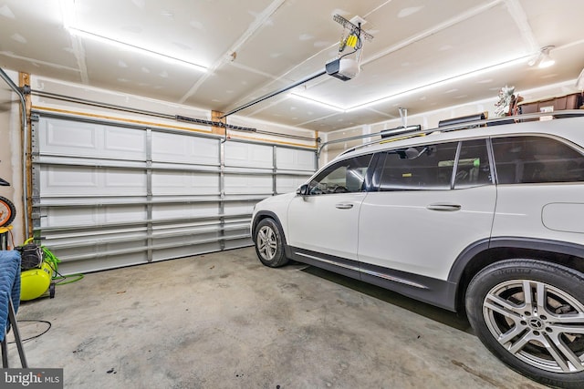 2314 Emerson Ln, Fredericksburg, VA 22401 - garage featuring a garage door opener