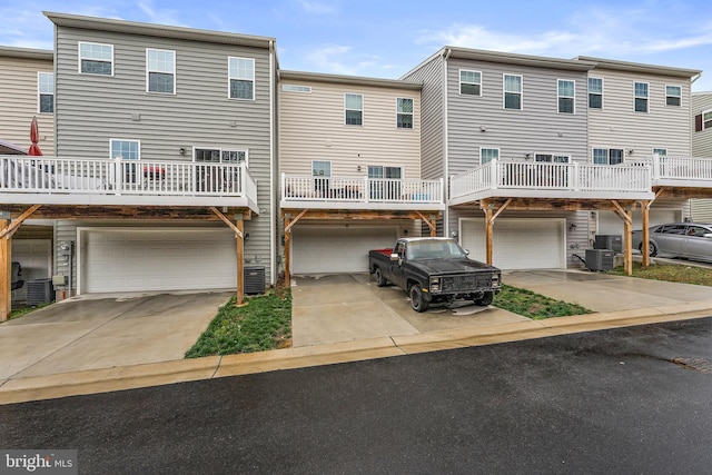 2314 Emerson Ln, Fredericksburg, VA 22401 - back of property with a garage, central AC unit, and driveway