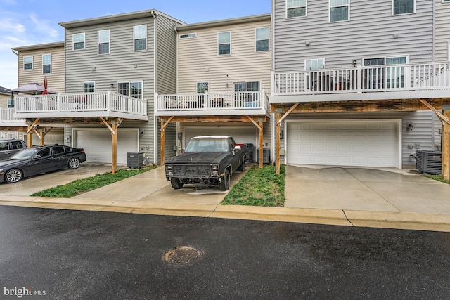2314 Emerson Ln, Fredericksburg, VA 22401 - rear view of property with a garage, central AC, and driveway