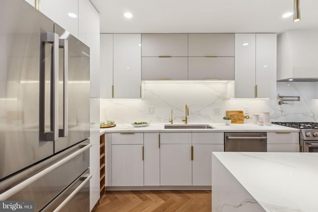 728 S Warnock St, Philadelphia, PA 19147 - kitchen featuring stainless steel appliances, a sink, modern cabinets, white cabinets, and recessed lighting