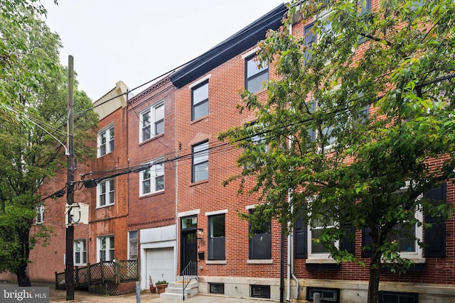 728 S Warnock St, Philadelphia, PA 19147 - view of building exterior with a garage