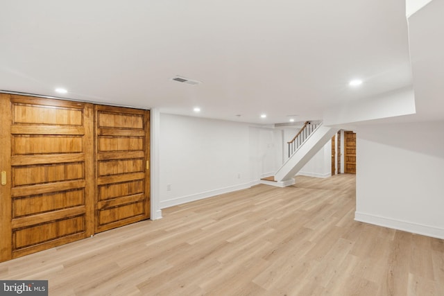 728 S Warnock St, Philadelphia, PA 19147 - finished below grade area with stairway, light wood finished floors, recessed lighting, and baseboards