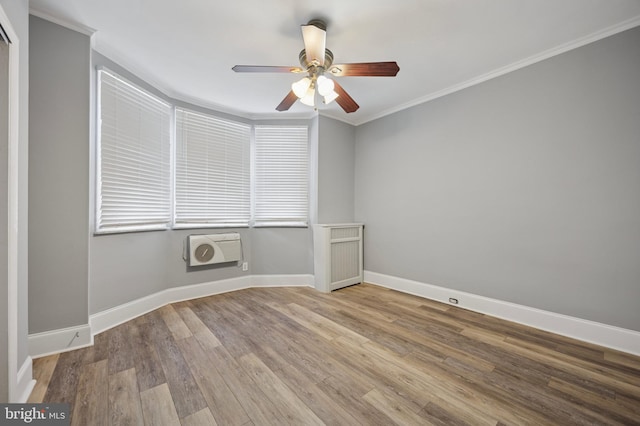 1321 Wolf St, Philadelphia, PA 19148 - unfurnished room with a ceiling fan, wood finished floors, crown molding, and baseboards