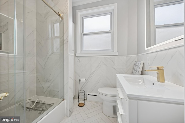 1321 Wolf St, Philadelphia, PA 19148 - bathroom with a shower with shower door, toilet, vanity, a wainscoted wall, and tile walls