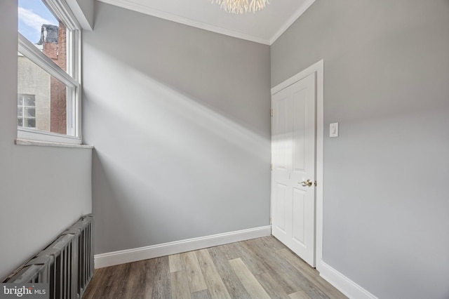 1321 Wolf St, Philadelphia, PA 19148 - unfurnished room with radiator, ornamental molding, wood finished floors, and baseboards