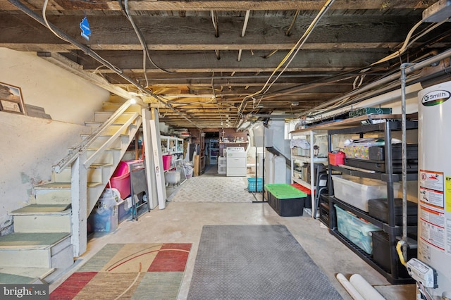 1321 Wolf St, Philadelphia, PA 19148 - unfinished basement featuring gas water heater