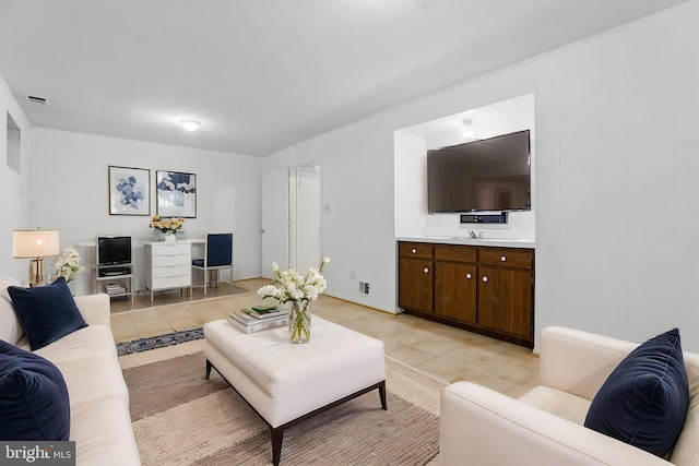 living area featuring light tile patterned floors