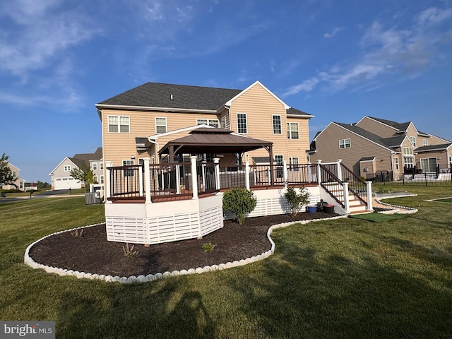 308 Galloway St, Middletown, DE 19709 - rear view of house with a gazebo, a lawn, a deck, and a residential view