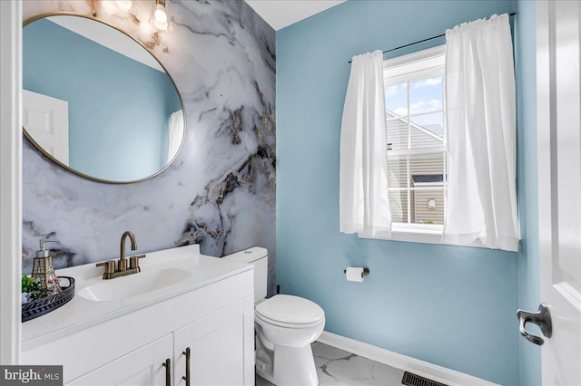 308 Galloway St, Middletown, DE 19709 - bathroom featuring marble finish floors, toilet, vanity, and baseboards