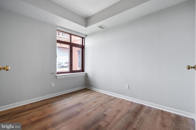2400 Clarendon Blvd Unit 916, Arlington, VA 22201 - spare room with wood finished floors and baseboards