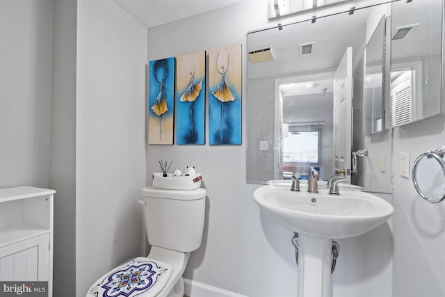 2400 Clarendon Blvd Unit 916, Arlington, VA 22201 - half bath featuring toilet and a sink