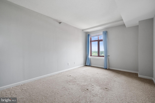 2400 Clarendon Blvd Unit 916, Arlington, VA 22201 - spare room with baseboards and carpet