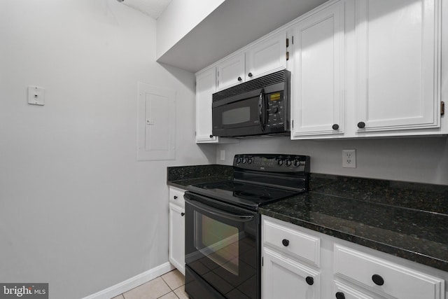 2400 Clarendon Blvd Unit 916, Arlington, VA 22201 - kitchen featuring black appliances, electric panel, light tile patterned flooring, white cabinets, and dark stone counters