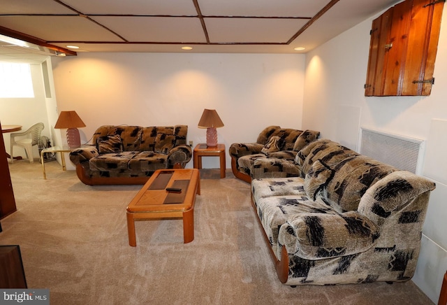 carpeted living area featuring recessed lighting