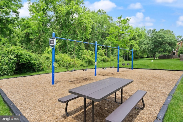 9882 High Water Ct, Burke, VA 22015 - community play area featuring a lawn