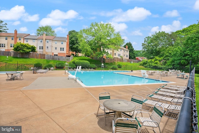 9882 High Water Ct, Burke, VA 22015 - community pool with a patio area